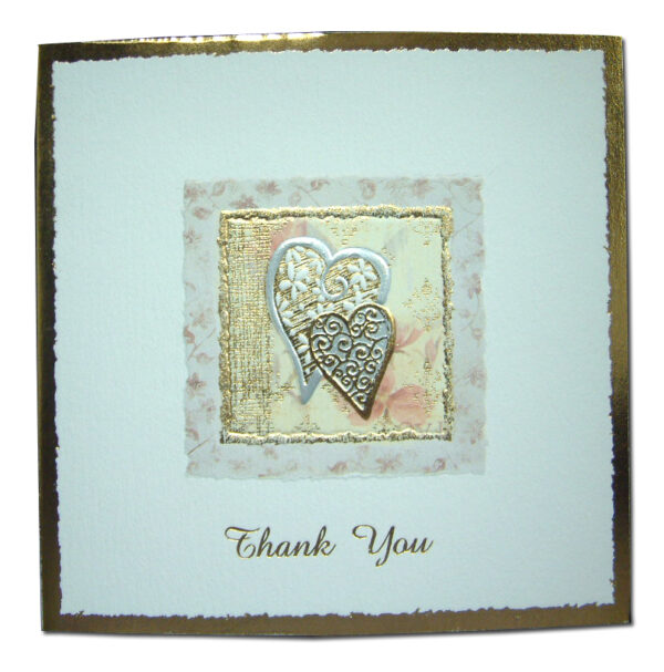 shiny gold and white thank you card with floral border