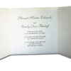 white folded wedding invitation