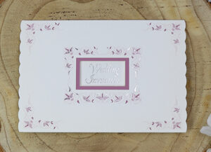 Embossed off white wedding card