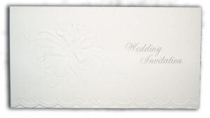 simplistic white folded wedding invitation with floral border