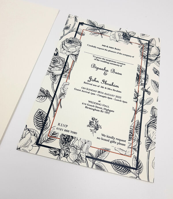 white and black floral wedding invitations with seasonal wildlife