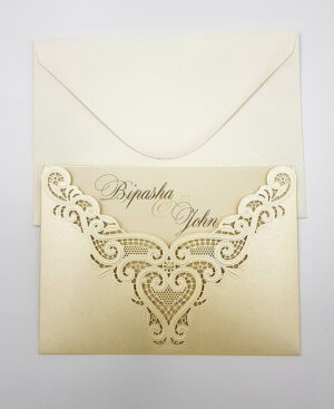 Elegant lasercut pocket invitation in ivory cardstock