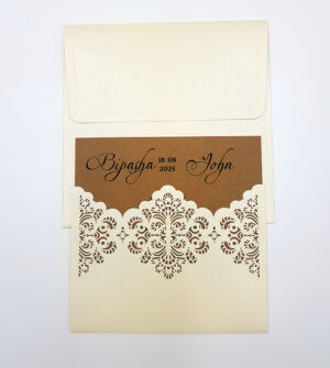 Pocket ivory lasercut invitation with floral design