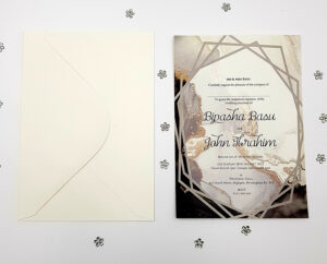 modern geometric wedding invitations in gold and black