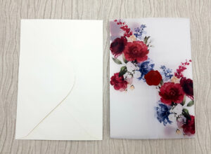 Sheer vellum overlay wedding invitations with flower print