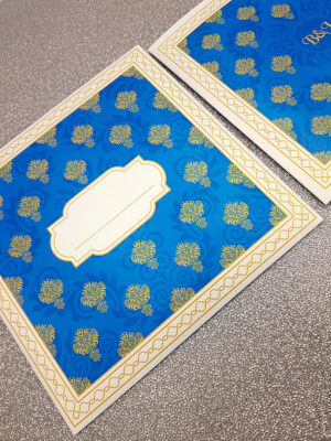 Asian wedding invitation cards in blue and gold