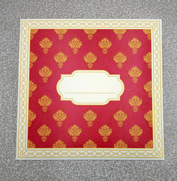 Indian hindu wedding invitation card in pink and gold