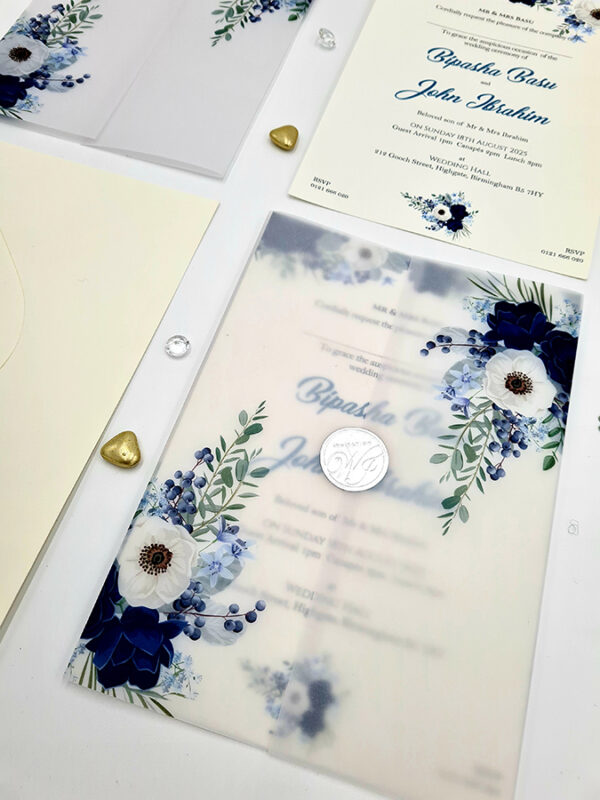 vellum layered wedding invitation in bue and grey