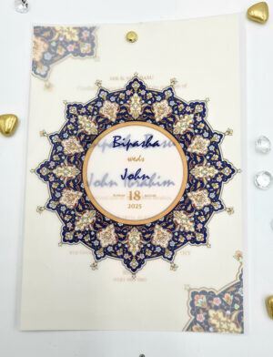 Indian Mandala vellum cover invitations with gold pin