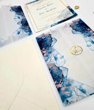 Marble effect vellum overlay wedding invitations in blue