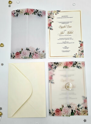Pink florals vellum wrapped invitations