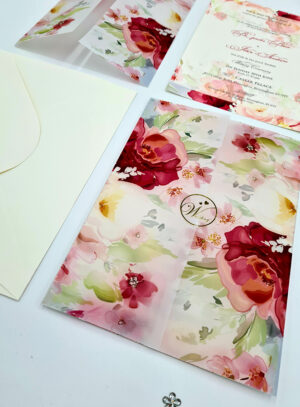 Gorgeous burgundy flowers vellum wrapped invitations