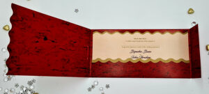Sikh Punjabi Wedding invitation in red and gold